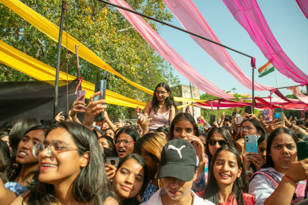 NEW DELHI, INDIA - MARCH 28: Crowds enjoy the performance of Singer Prabh Gill during the Vivekananda Collegeâs annual fest, âPallavi â25â, at Vivek Vihar campus, on March 28, 2025 in New Delhi, India. (Photo by Raajessh Kashyap/Hindustan  Times)のeditorial素材