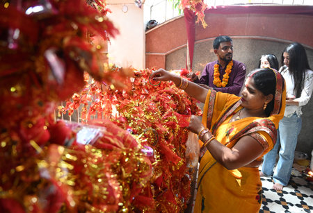 NEW DELHI INDIA APRIL 3 2025 Devotees offering Prayers on the second day chaitra Navratri festival...