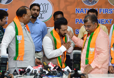 MUMBAI INDIA APRIL 8 2025 Cricketer Kedar Jadhav joins BJP in presence of BJP president Chandrashekhar Bawankule and working president Ravindra Chavan BJP leader Ashok Chavan at BJP office Nariman Point on April 8 2025 in Mumbai India Photo by Bhushan Koyのeditorial素材