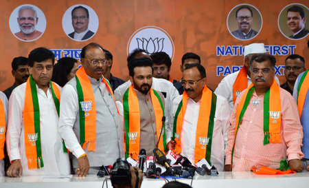 MUMBAI INDIA APRIL 8 2025 Cricketer Kedar Jadhav joins BJP in presence of BJP president Chandrashekhar Bawankule and working president Ravindra Chavan BJP leader Ashok Chavan at BJP office Nariman Point on April 8 2025 in Mumbai India Photo by Bhushan Koyのeditorial素材