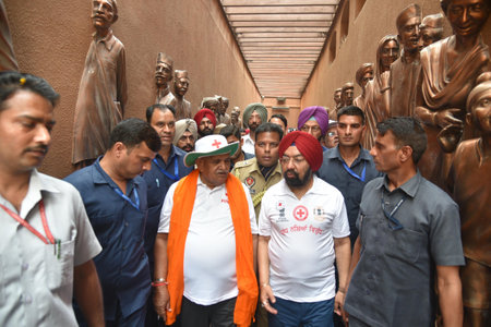 AMRITSAR INDIA APRIL 8 2025 Punjab Governor Gulab Chand Kataria along with Rajya Sabha MP Vikramjit Singh Sahney during the six days of the padyatra against drugs as part of Yudh Nasheyan Virudh Campaign concluded at the Jallianwala Bagh on April 8 2025 iのeditorial素材
