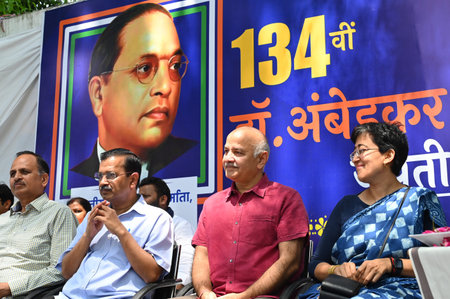 NEW DELHI INDIA APRIL 14 2025 AAP National convener Arvind Kejriwal with Manish Sisodia and Atishi pays tribute to Bharat Ratna Babasaheb Bhimrao Ambedkar on occasion of his birth anniversary at the party office HQ on April 14 2025 in New Delhi India Photのeditorial素材