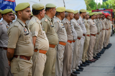 NOIDA INDIA APRIL 14 2025 Gautam Budh Nagar Fire Department observes Fire Service Memorial Day to pay tribute to all those brave firefighters who sacrificed their lives in line of duty at Fire Station Sector 2 on April 14 2025 in Noida India National Fireのeditorial素材