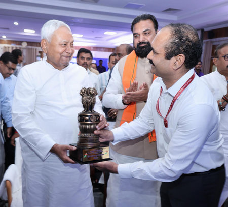 PATNA INDIA APRIL 14 2025 Bihar Chief Minister Nitish Kumar being honoured after inaugurating logo of Khelo India Youth Games Bihar 2025 at Samvad CM Secretariat on April 14 2025 in Patna India Photo by Santosh Kumar Hindustan Timesのeditorial素材