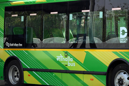 NEW DELHI INDIA APRIL 22 2025 A fleet of DTC DEVI Delhi Electric Vehicle Interconnector electric buses Previously called the mohalla bus service by the Aam Aadmi Party AAP government parked at Kushak drain bus depot whose inauguration has been postponed dのeditorial素材
