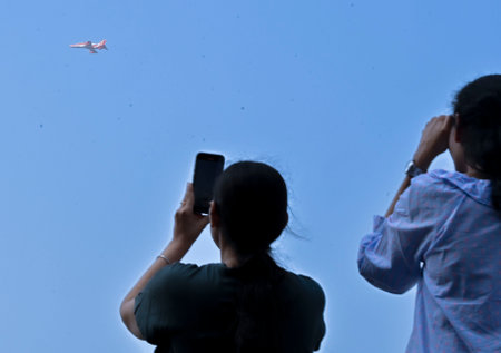 MUMBAI, INDIA â JANUARY 11: Indian Air force \"Surya Kiran\" rehearsal for upcoming air display at Marine Drives on January 11, 2024 in Mumbai, India. The event comprises aerobatic displays by the Surya Kiran Aerobatic Display Team (SKAT) and the Helicoのeditorial素材