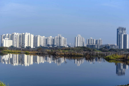 GURUGRAM, INDIA â JANUARY 15: The dirty water of the Najafgarh drain fill in field at Dharampur village near woodshire residential society, sector-107; to prevent urban flooding, DTCP to include natural drainage features in urban development plans, on Jのeditorial素材