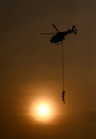 LUCKNOW, INDIA - JANUARY 15: IAF Helicopters fly past during 'Saurya Sandhya' on the occasion of Army Day at Surya Khel Parisar on January 15, 2024 in Lucknow, India. (Photo by Deepak Gupta/Hindustan Times)のeditorial素材