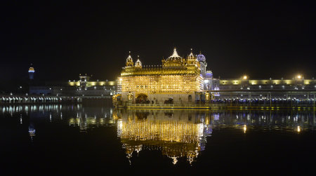 AMRITSAR, INDIA - JANUARY 16:  A view of the illuminated Golden Temple on the eve of the birth anniversary of the tenth Guru of the Sikhs, Guru Gobind Singh on January 16, 2024 in Amritsar, India. (Photo by Sameer Sehgal/Hindustan Times)のeditorial素材