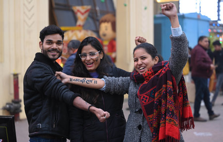 LUCKNOW, INDIA - JANUARY 19:   Ankit Vishwakarma selflessly making Lord Ram Tattoos in Lucknow's Hazratganj aea free of cost ahead of consecration ceremony of Shri Ram Janmbhoomi Temple  on January 19, 2024 in Lucknow, India.  (Photo by Deepak Gupta/Hinduのeditorial素材
