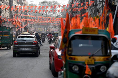 NEW DELHI, INDIA â JANUARY 20: An auto decorated with flags of Ram Mandir, at Kamla Nagar Market ahead of the Shri Ram temple 'Pran Pratishtha' in Ayodhya, on January 20, 2024 in New Delhi, India. (Photo by Salman Ali/Hindustan Times )のeditorial素材