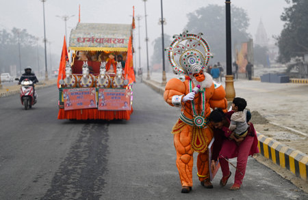 AYODHYA, INDIA - JANUARY 17:  An artist artist dressed up as Lord Hanuman marching on Rampath ahead of the consecration ceremony of Shri Ram Janmbhoomi Temple  on January 17, 2024 in Ayodhya, India. The consecration ceremony of Ram Temple will be held in のeditorial素材
