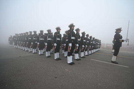 NEW DELHI, INDIA â JANUARY 14: Amid zero visibility thick fog blankets, Indian coast guard personnel rehearse for the upcoming Republic Day parade, at Vijay Chowk, on January 14, 2024 in New Delhi, India. Foggy morning challenges Delhi-NCR with intensifのeditorial素材
