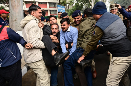 CHANDIGARH, INDIA - JANUARY 31: Chandigarh Police detaining Chandigarh Youth Congress workers during...