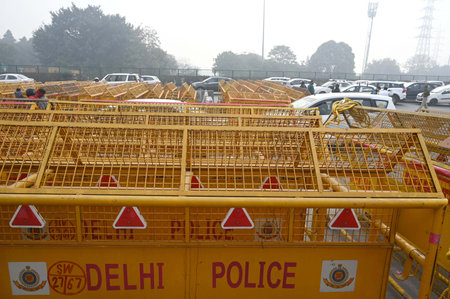 GURUGRAM, INDIA - FEBRUARY 13: Traffic congestion at Delhi-Gurugram Expressway due to Delhi Police officials put barricades after the Delhi Chalo protest called by farmers near Sirhaul toll plaza on February 13, 2024 in Gurugram, India.  Massive deploymenのeditorial素材
