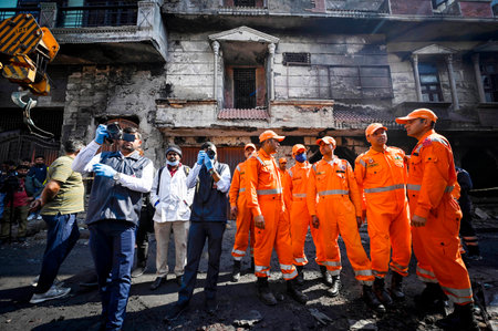 NEW DELHI, INDIA - FEBRUARY 16: NDRF team at the site of a paint godown that caught fire last night, resulting in the death of 11 people  on February 16, 2024 in New Delhi, India.(Photo by Raj K Raj/Hindustan Times)のeditorial素材