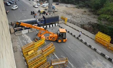 NEW DELHI, INDIA - FEBRUARY 12: Delhi Police officials put barricades as a preventive measure after...