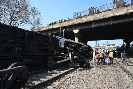 NEW DELHI, INDIA -FEBRUARY 17: A view of 10 wagons of a goods train derailed on the Patel Nagar-Dayabasti section, on February 17, 2024 in New Delhi, India. The incident happened when the train was passing under the Zakhira flyover on Saturday morning neaのeditorial素材