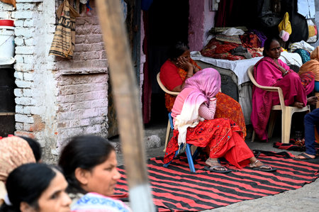 NEW DELHI, INDIA - FEBRUARY 25: Family members grief after a 18 month old child died after street dogs attack and bite during yesterday evening at Tughlak lane Dhobi Ghat, on February 25, 2024 in New Delhi, India. (Photo by Salman Ali/Hindustan Times )のeditorial素材