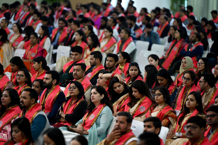 NEW DELHI, INDIA -FEBRUARY 24: Students during the 100th convocation of the Delhi University to award medals and prizes to the meritorious students and confer the degrees, at DU Sports complex, on February 24, 2024 in New Delhi, India. Jagdeep Dhankhar, pのeditorial素材