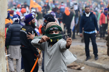AMBALA, INDIA - FEBRUARY 21: Police action on agitated farmers at Shambhu Border of Punjab and Haryana onFebruary 21, 2024 near Ambala, India. The situation at the Punjab-Haryanas Shambhu and Khanauri state border points turned intense after a clash betweのeditorial素材