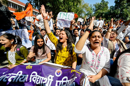 NEW DELHI, INDIA - MARCH 5:  Akhil Bharatiya Vidyarthi Parishad (ABVP) activists shout Saugus during the demonstration against Mamata Banerjee's government to demand justice for women who have fallen victim to heinous crimes in Sandeshkhali, at Banga Bhawのeditorial素材