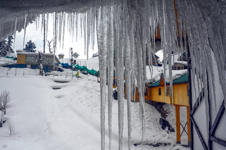 SRINAGAR, INDIA - FEBRUARY 25: Icicles hang from the window of a hotet at at famous snow covered ski resort, Gulmarg, about 55kms from on February 25, 2024 in Srinagar, India. (Photo by Waseem Andrabi/Hindustan Times )のeditorial素材