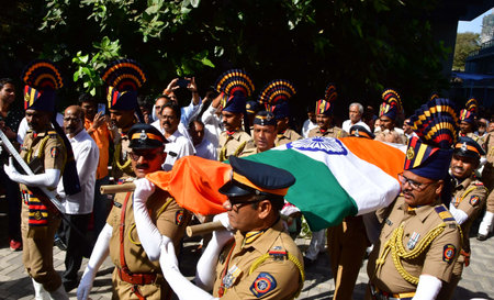 MUMBAI, INDIA - FEBRUARY 23:  Family and Relatives, with others, pay last respect to the mortal...