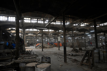 KOLKATA, INDIA - FEBRUARY 27: Labourers work at factory section while a fire broke out at godown of Calcutta Jute Mill on February 27, 2024 in Kolkata, India. 10 fire engine rushed to the spot and no casualties reported. (Photo by Samir Jana/Hindustan Timのeditorial素材