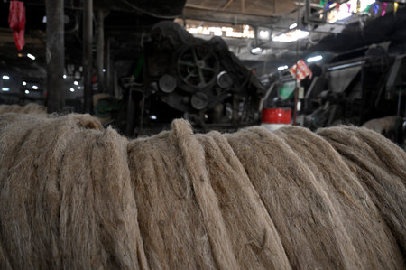 KOLKATA, INDIA - FEBRUARY 27: Labourers work at factory section while a fire broke out at godown of Calcutta Jute Mill on February 27, 2024 in Kolkata, India. 10 fire engine rushed to the spot and no casualties reported. (Photo by Samir Jana/Hindustan Timのeditorial素材