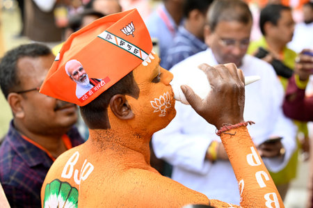 NORTH 24 PARGANAS, INDIA - MARCH 6:   A Bharatiya Janata Party (BJP) supporter paints his body...
