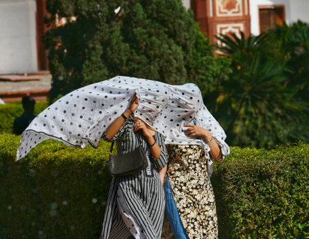 NEW DELHI, INDIA - MARCH 18: Tourists seen on a hot summer day at Humayun's Tomb, on March 18, 2024...
