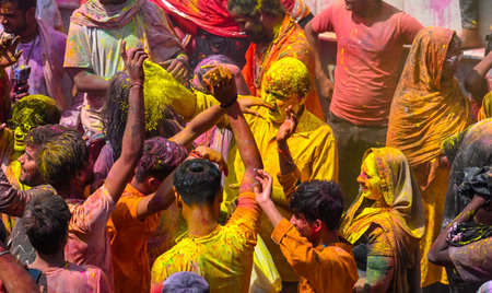 MATHURA, INDIA - MARCH 19: People smear each other with colored powder during the Lathmar Holi festival, at Nandji Temple on March 19, 2024 in Mathura, India. (Photo by Raj K Raj/Hindustan Times)のeditorial素材
