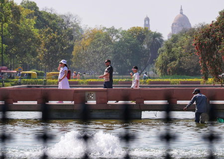 NEW DELHI, INDIA - MARCH 20:  Visitors at Kartavya Path in the afternoon   on March 20, 2024 in New Delhi, India. Delhi residents have started to feel heat as tempretures are rising with each passing day. The maximum temperature is likely to be 33 degreesのeditorial素材
