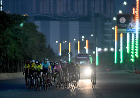 GREATER NOIDA, INDIA - MARCH 17: Cyclists participate in a 55 kilometers long Cyclothon near Gaur city mall road, on March 17, 2024 in Greater Noida, India. HCL Cyclothon was organized under the aegis of Cycling Federation of India and in association withのeditorial素材