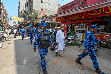 NEW DELHI, INDIA - MARCH 12: Delhi Police and Security personnel Flag march at the shaheen bagh a day after the Ministry of Home Affairs notified the rules for implementation of the Citizenship (Amendment) Act on March 12, 2024 in New Delhi, India. (Photoのeditorial素材