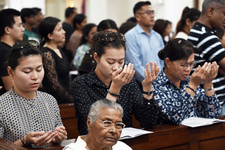 NEW DELHI, INDIA - MARCH 29: Christian community people offer prayer at Sacred Heart Cathedral Catholic Church, Gol Dak Khana on the occasion of Good Friday on March 29, 2024 in New Delhi, India. (Photo by Sanjeev Verma/Hindustan Times)のeditorial素材