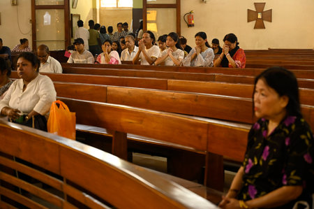 KOLKATA, INDIA - MARCH 29: Christian devotees offer prayer on Good Friday at St. Mary's Church on...