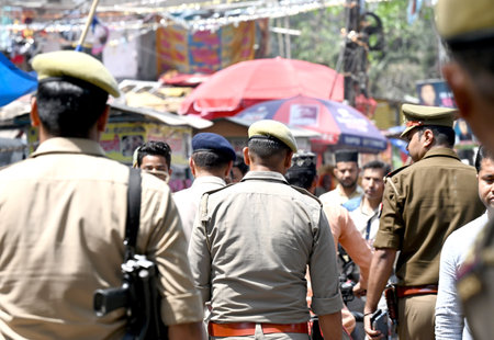 NOIDA, INDIA - MARCH 29: Noida Police personnel conducted a flag march in Sector 8 as security...