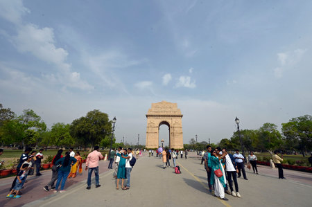 NEW DELHI, INDIA - MARCH 28: Visitors out on a hot afternoon at India Gate on March 28, 2024 in New...