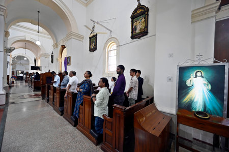 NEW DELHI, INDIA - MARCH 29: Christian community people offer prayer at Sacred Heart Cathedral...