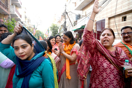 NOIDA, INDIA - APRIL 8: Uma Sharma, wife of BJP candidate from Gautam Buddh Nagar parliamentry constituency Dr. Mahesh Sharma and other BJP worker doing door to door campaigning for Lok Sabha elections in Sector 15 on April 8, 2024 in Noida, India. (Photoのeditorial素材