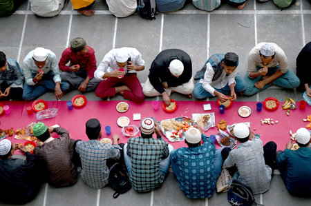 NOIDA, INDIA - APRIL 10: On the last day of Ramadan, Muslims offer prayers before breaking their fast (Roza) with the Iftar meal at Jama Masjid during the ongoing month of Ramadan (Ramzan) in sector 8, on April 10, 2024 in Noida, India. (Photo by Sunil Ghのeditorial素材