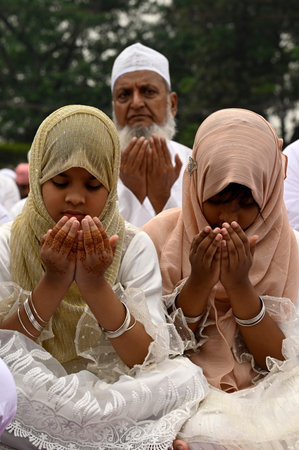 KOLKATA, INDIA - APRIL 11:  Muslim devotees offer Eid-Ul-Fitr prayers (namaz) at Red road  on April...