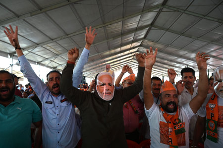 UDHAMPUR, INDIA - APRIL 12:  Peolpe attend a rally led by Prime Minister Narendra Modi ahead of Lok...