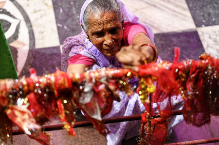 LUCKNOW, INDIA - APRIL 9: Devotees offering on the first day of Navratri at Kalibari Temple  on...