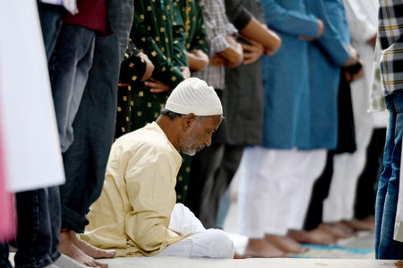 NOIDA, INDIA - APRIL 11:  Muslims offer prayers (namaz) on the occasion of Eid-Ul-Fitr at the Sector 8 Jama Masjid on April 11, 2024 in Noida, India.  Muslims around the world are getting into the festive Eid spirit as the holy month of Ramadan concludes.のeditorial素材