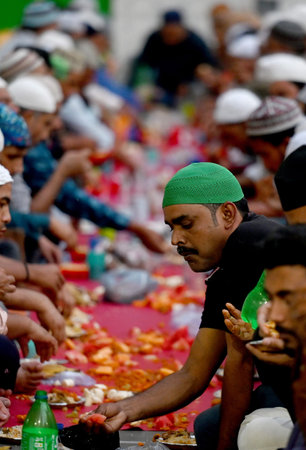 NOIDA, INDIA - APRIL 10: On the last day of Ramadan, Muslims offer prayers before breaking their fast (Roza) with the Iftar meal at Jama Masjid during the ongoing month of Ramadan (Ramzan) in sector 8, on April 10, 2024 in Noida, India. (Photo by Sunil Ghのeditorial素材