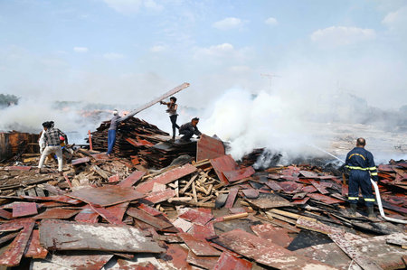 GURUGRAM, INDIA - APRIL 21: A massive fire broke out in a wooden material godown in Bajghera village near Dwarka expressway, fire department official said that no one was injured in this incident, on April 21, 2024 in Gurugram, India. (Photo by Parveen Kuのeditorial素材