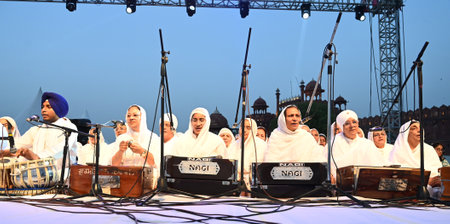NEW DELHI, INDIA - APRIL 27: Sri Rehras Sahib Kirtan during the Delhi Fateh Diwas, (Delhi Victory Day) commemorating the 400th birth anniversary of Mata Gujri Ji, organized by the Delhi Sikh Gurdwara Management Committee (DSGMC). at Red Fort, on April 27,のeditorial素材